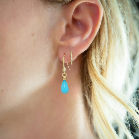 with our diamond huggie hoops<br>in white diamonds <span class='visuallyhidden'>Call or text 323-404-2959 if you need shopping assistance.</span>